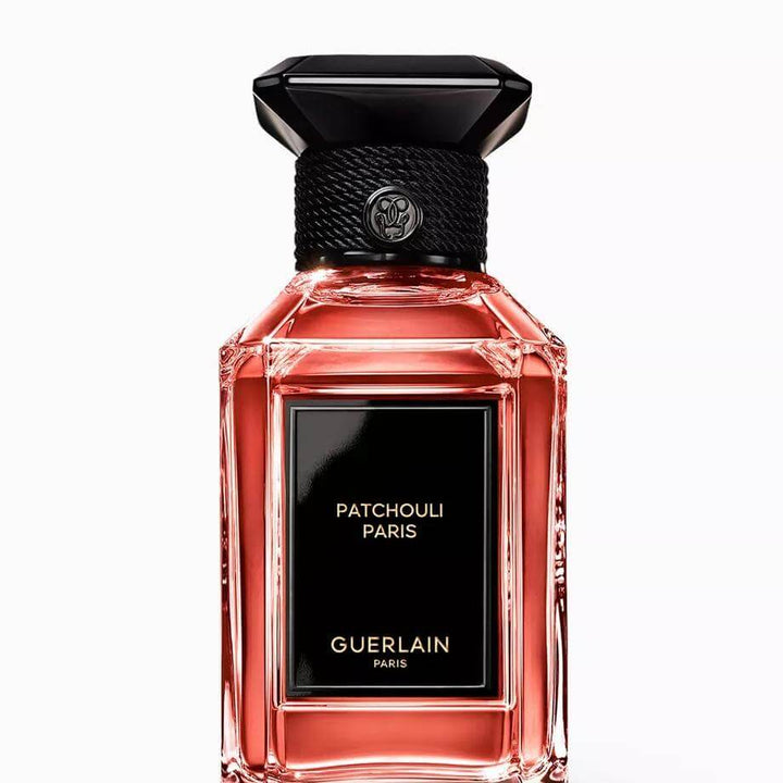 Guerlain Patchouli Paris perfume bottle on a white background