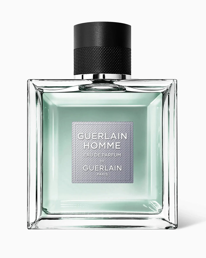 Guerlain Homme perfume bottle on a white background