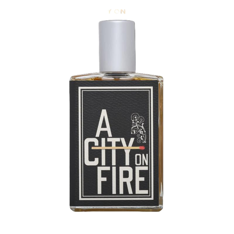 Perfume bottle labeled 'A City on Fire' with black background