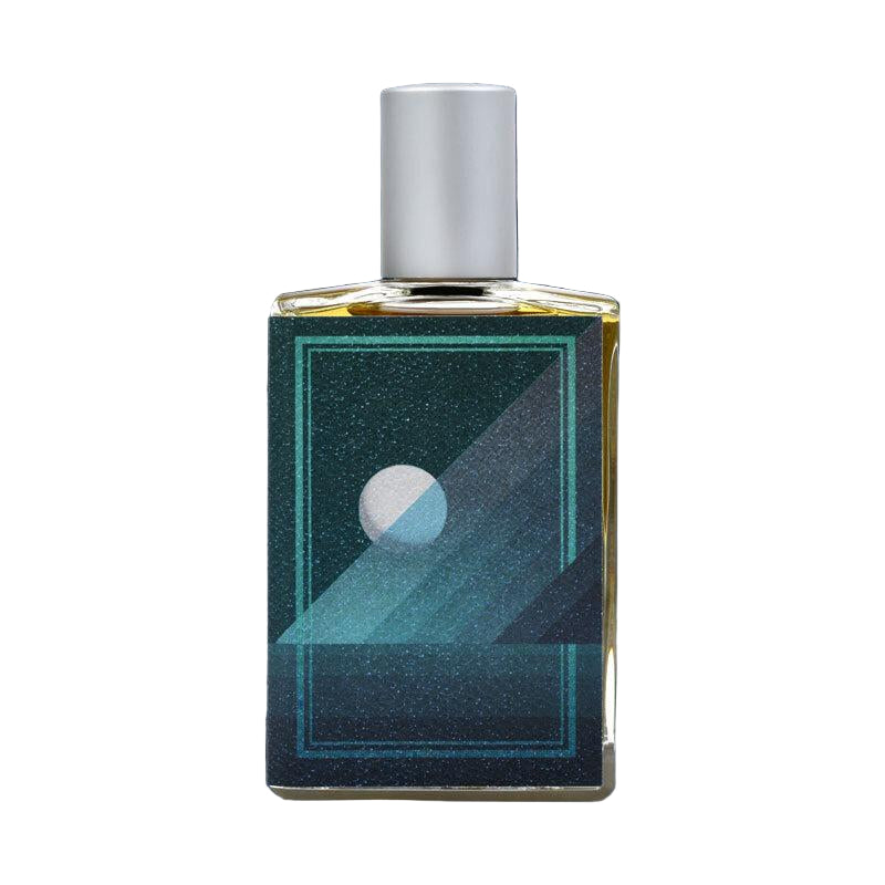 Perfume bottle with geometric design on a dark blue background