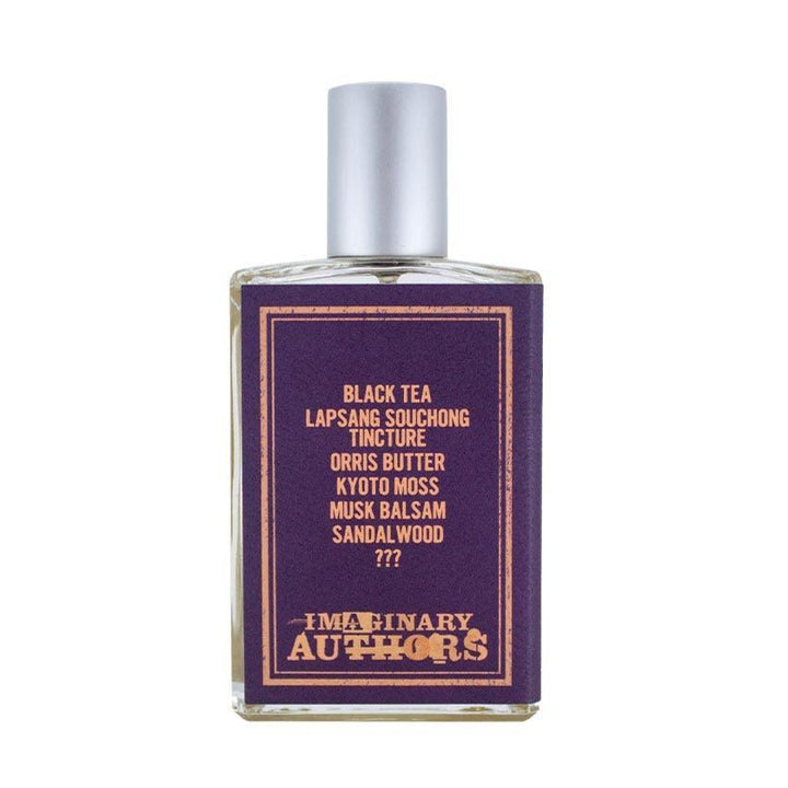 Perfume bottle with purple label and silver cap on a white background