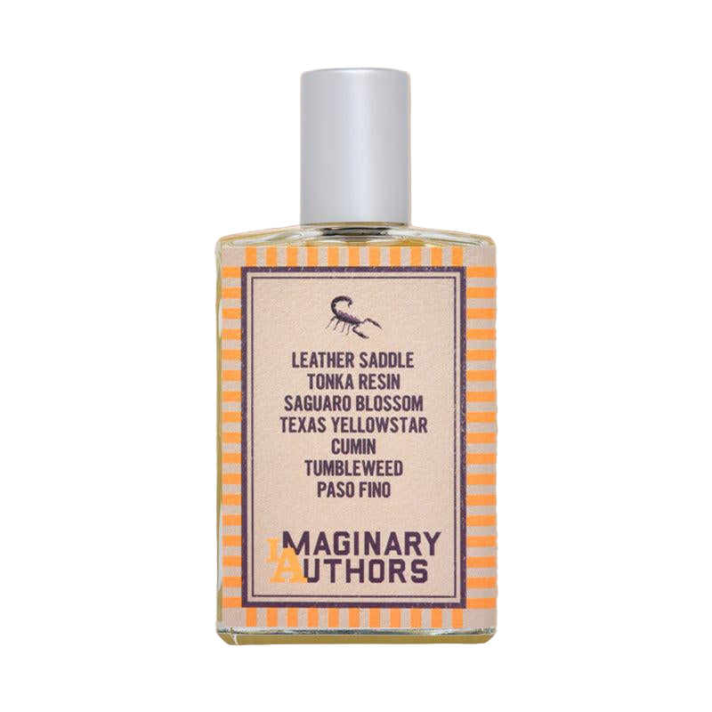 Perfume bottle with a label on a beige background