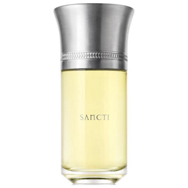 Perfume bottle with silver cap on a white background