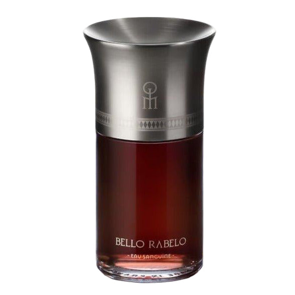 Perfume bottle labeled 'Bello Rabelo' with a silver cap on a reflective surface.