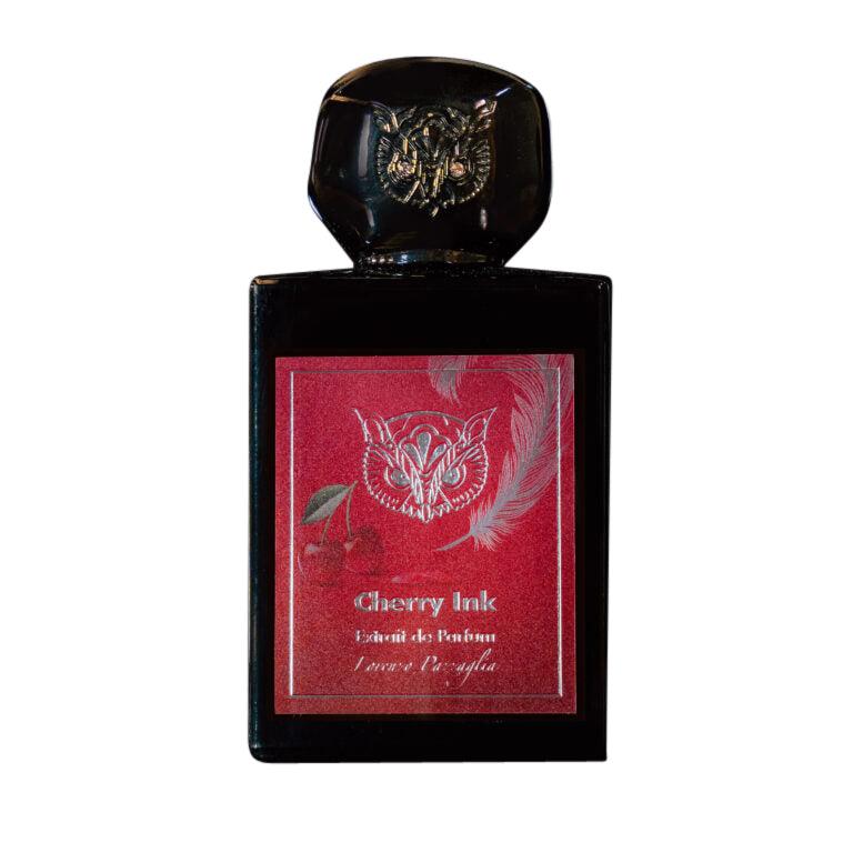 Perfume bottle labeled 'Cherry Ink' with a red label and black body on a white background