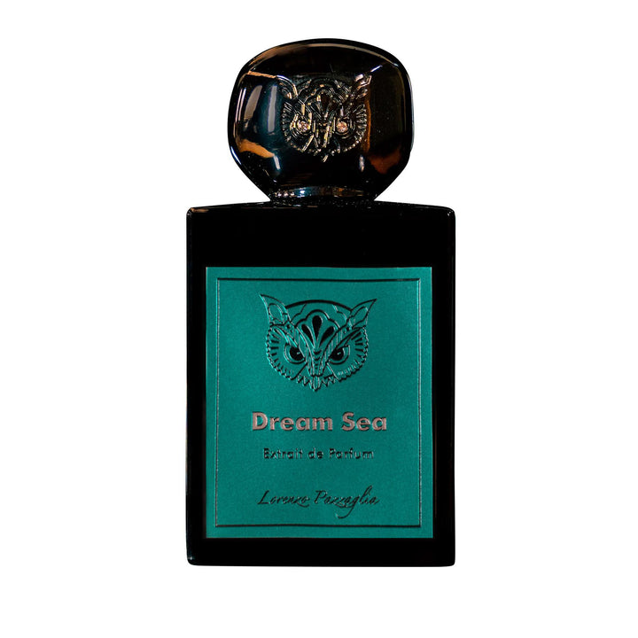 Perfume bottle labeled 'Dream Sea' with a decorative cap on a white background