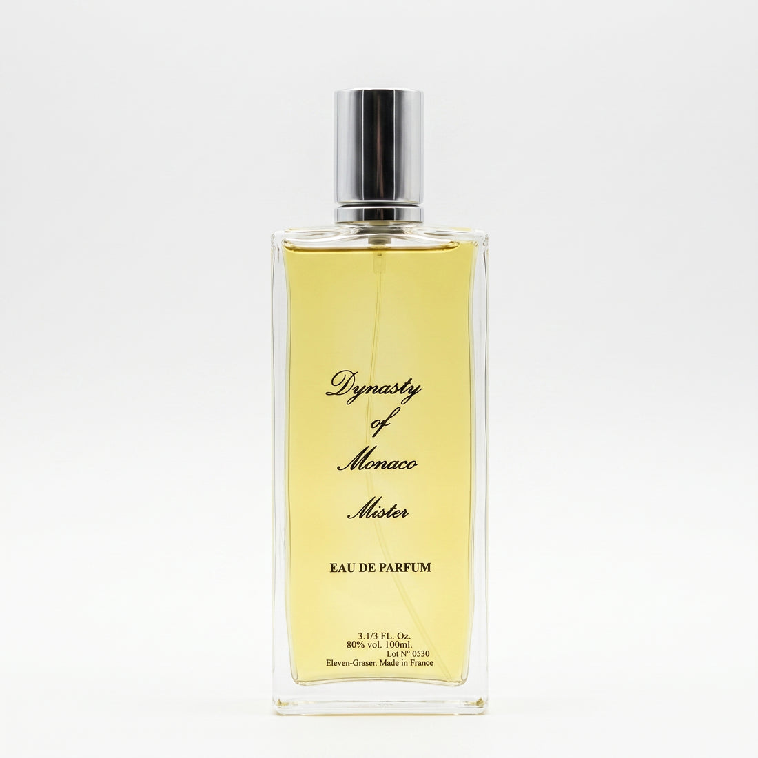 A rectangular glass perfume bottle filled with pale yellow liquid, featuring a silver cap and black cursive text reading 'Dynasty of Monaco Motor' and 'EAU DE PARFUM'.