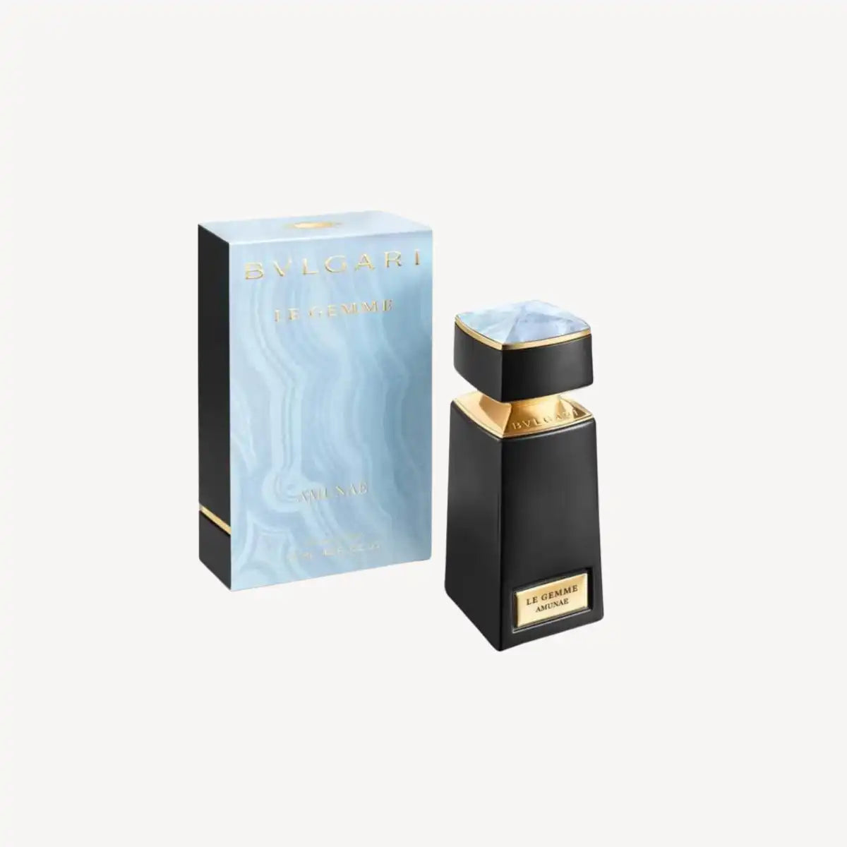 Bulgari perfume bottle and packaging on a white background