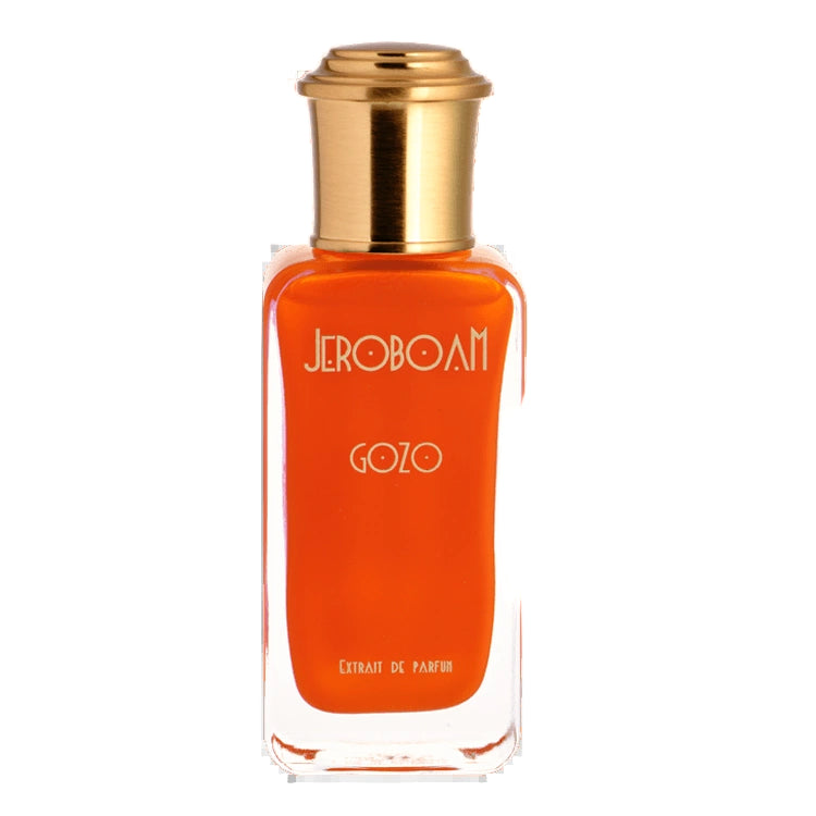 Orange perfume bottle with gold cap on a white background