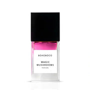 Perfume bottle labeled 'Magic Mushrooms' by BOHOBOCO on a white background