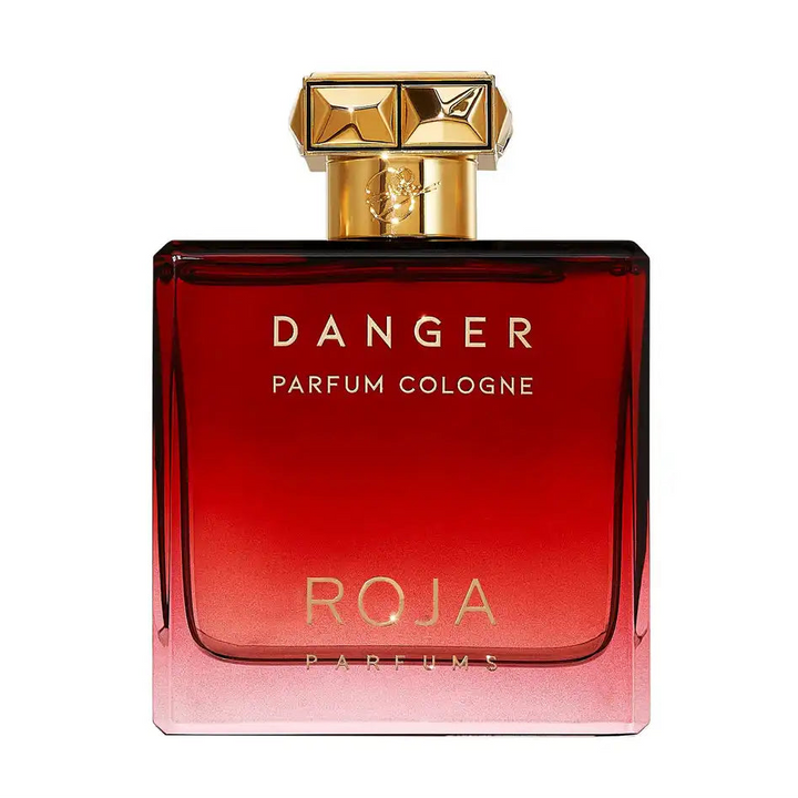 Red and gold Roja Parfums Danger Parfum Cologne bottle on a white background