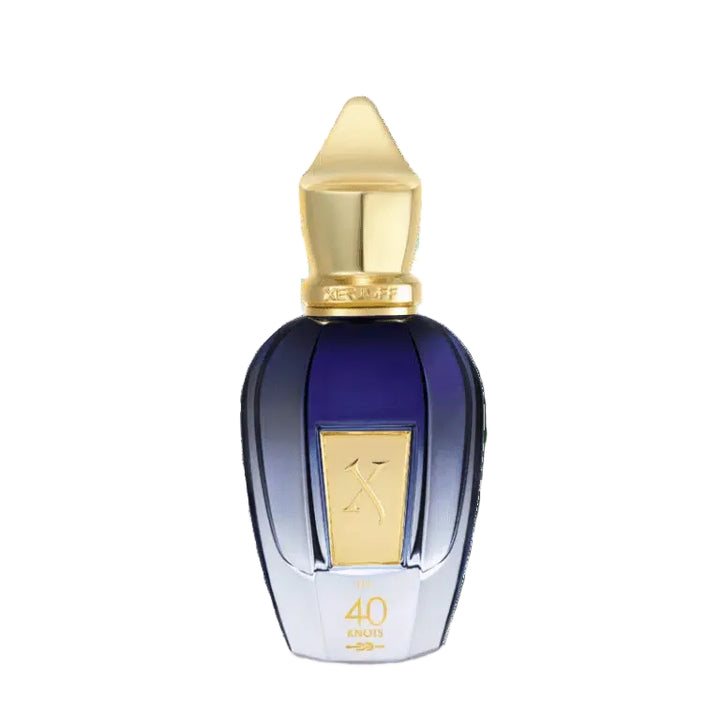 Perfume bottle with gold cap and base on a white background